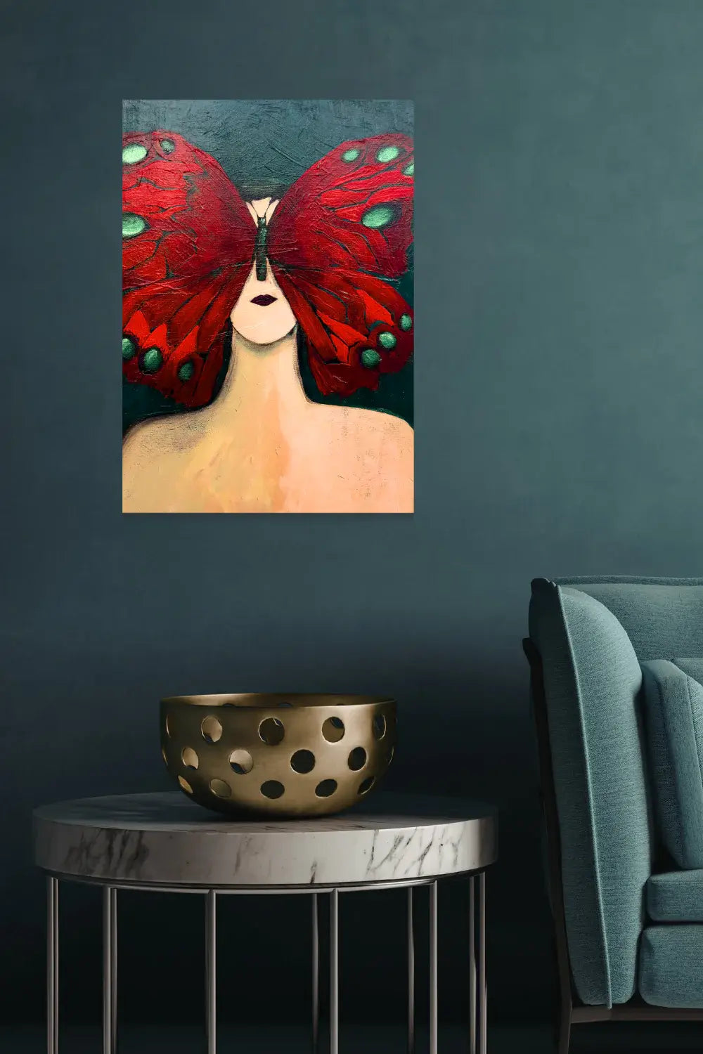 Artistic depiction of a person with red butterfly wings on a dark wall above a table with a decorative bowl. Title: Morph by Teri Stephens