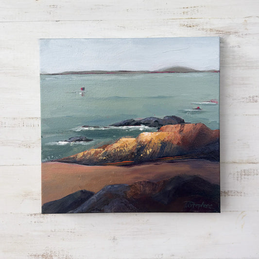 Painting of a coastal landscape with rocky shore and calm water on a textured white surface. Original artwork titled "Rock" by Teri Stephens.