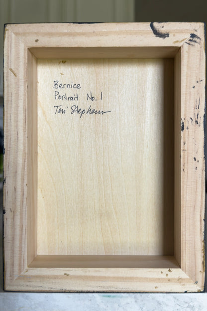 Wooden picture frame with 'Bernice Portrait No. 1 Teri Stephens' text inside