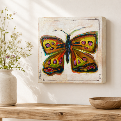 Born - an original butterfly painting featuring rich colors, painted by Tennessee artist Teri Stephens, styled in a cozy interior