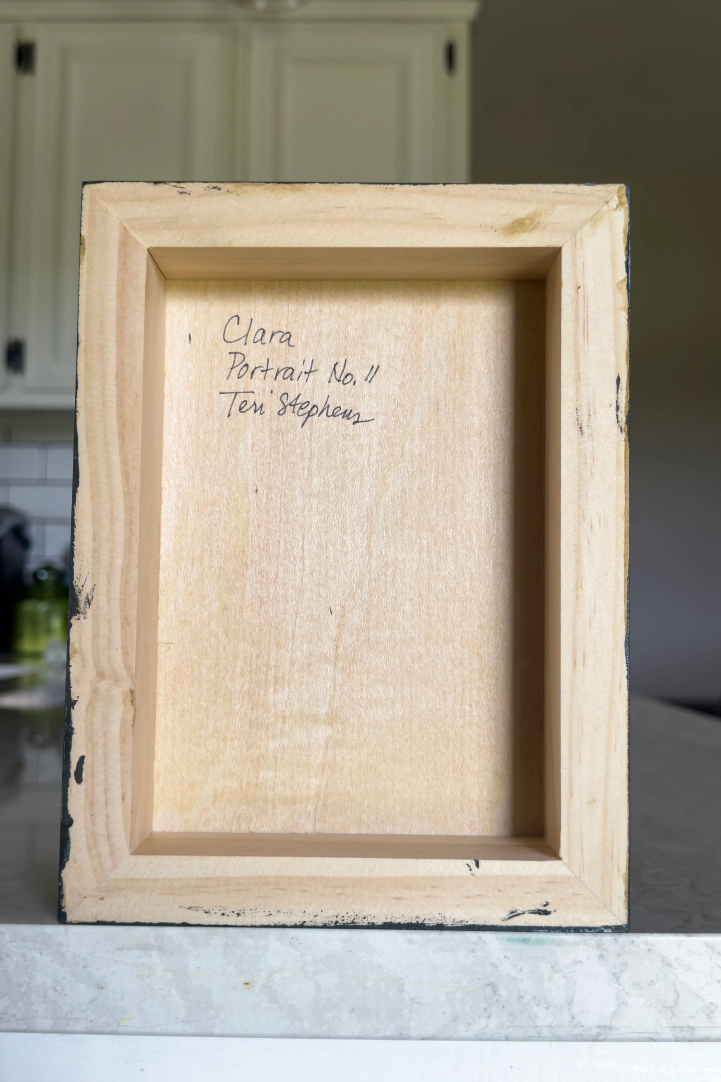 Wooden frame with 'Clara Portrait No. 11' by 'Teri Stephens'