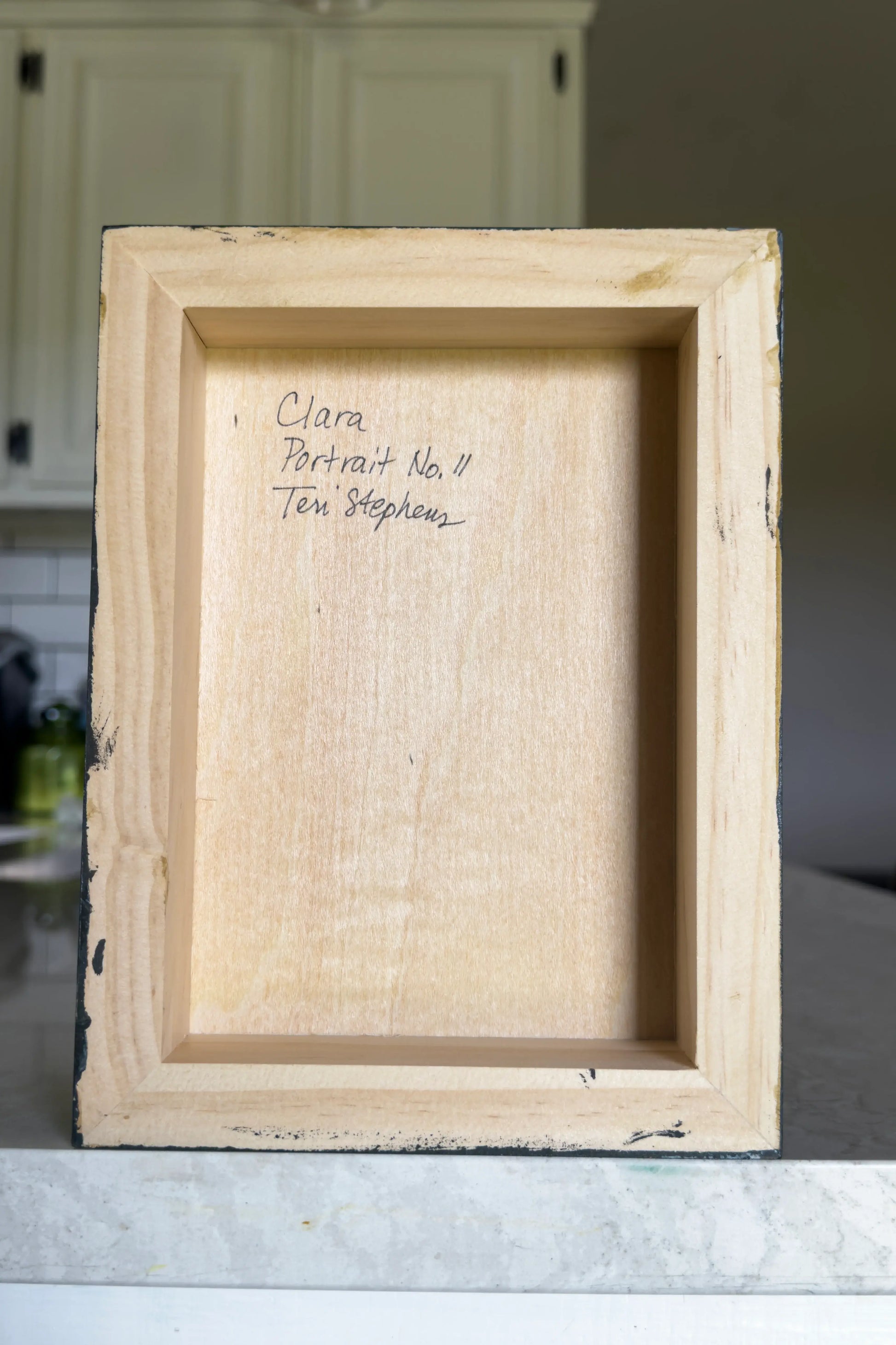 Wooden frame with 'Clara Portrait No. 11' by 'Teri Stephens'