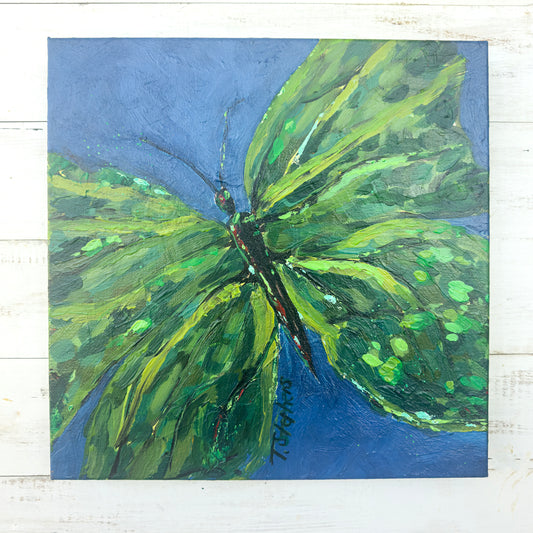 Original artwork titled 'Emerge' by Teri Stephens. Painting of a green butterfly on a blue background.