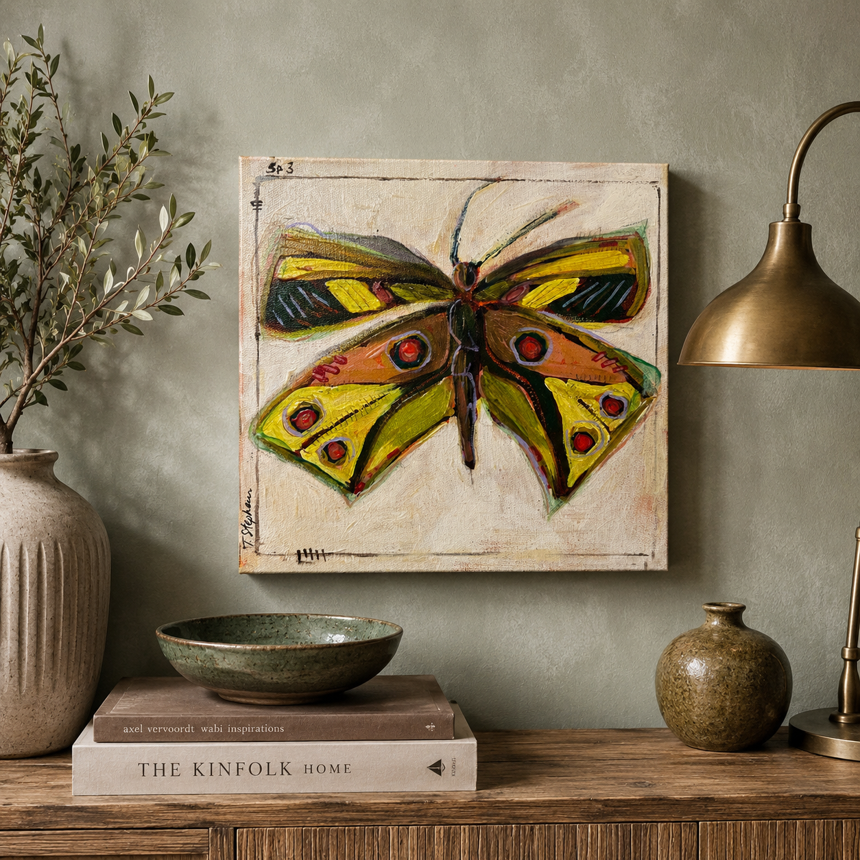 Fragment - an original butterfly painting featuring rich colors, painted by Tennessee artist Teri Stephens, styled in a cozy interior
