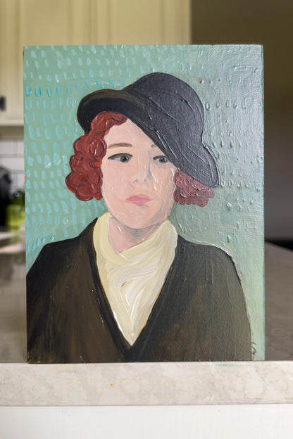 Painting of a person with red hair and a dark hat on a textured light blue background, titled Harper by artist Teri Stephens