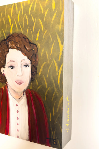 side view of painting titled "Harriet" by artist Teri Stephens, featuring a portrait of a woman wearing a red sweater on a texture green / gold background