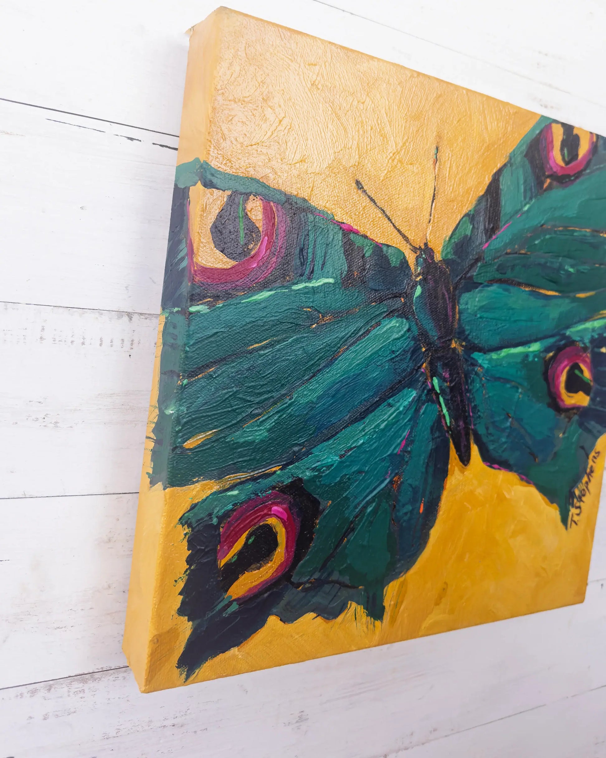 Canvas painting of a butterfly, angled view of original artwork titled "Jewel" by Teri Stephens