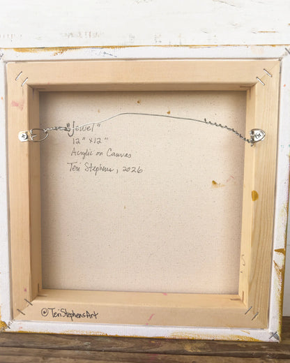 Back of a framed painting with artist's signature and details, "Jewel" by Teri Stephens