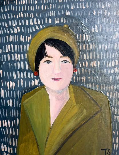 Artistic portrait of a person wearing a green coat and hat against a textured blue background. Title: June by artist Teri Stephens