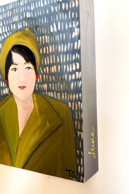 Painting of a woman wearing a green coat and yellow hat against a patterned background