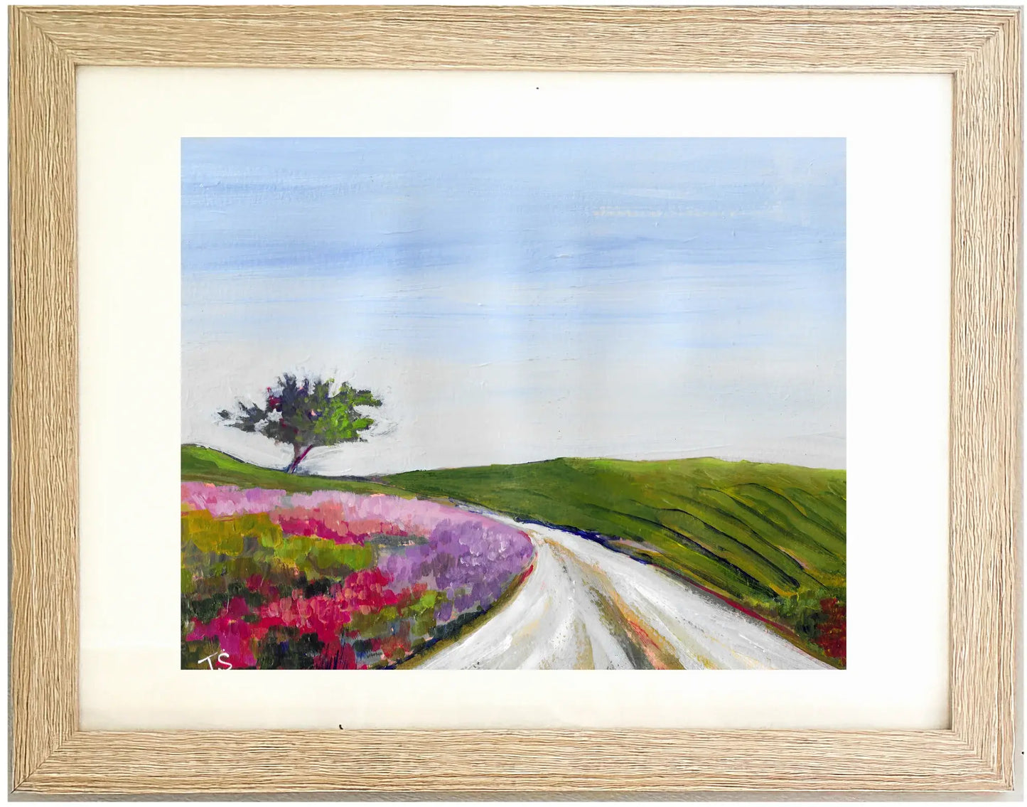 Framed painting of a landscape with a tree, path, and flowers. "Meadow" by Teri Stephens