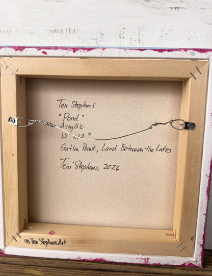 Artistic signature on a wooden frame with text, original painting titled "Pond" by Teri Stephens