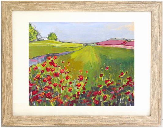 Framed painting of a landscape with red flowers, green fields, and a blue sky. Poppy by Teri Stephens