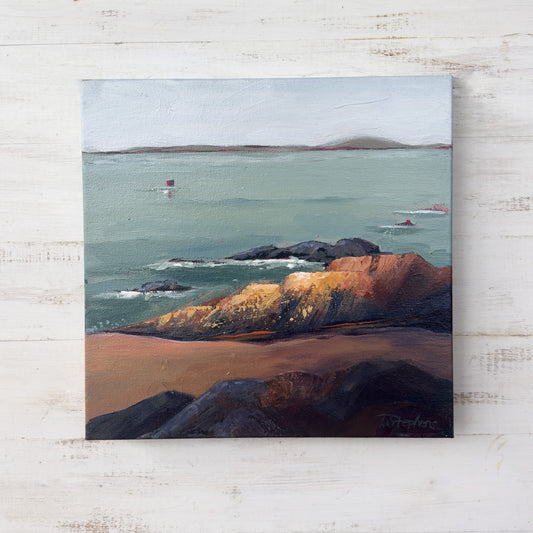 Painting of a coastal landscape with rocky shore and calm water on a textured white surface. Original artwork titled "Rock" by Teri Stephens.