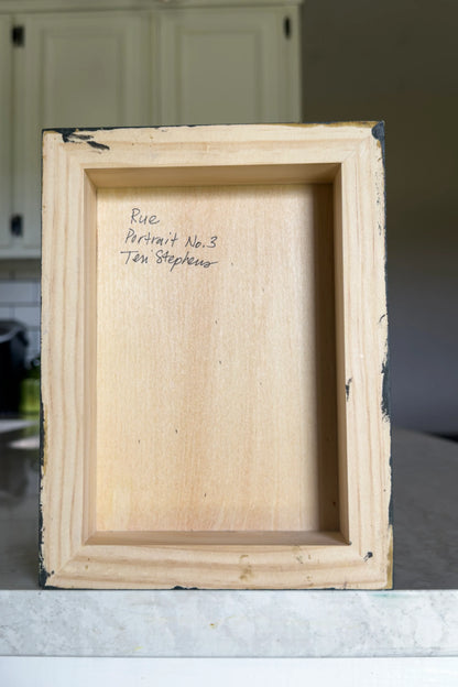 artist signature on back of painting on wood panel