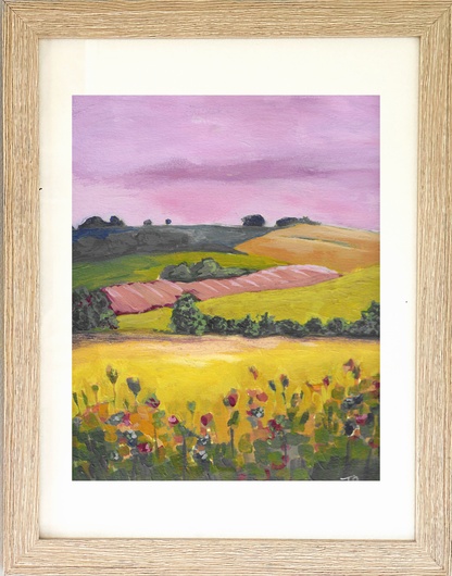 Framed artwork, titled "Slope", of a colorful landscape with rolling hills and a pink sky. Painted by Tennessee artist Teri Stephens.