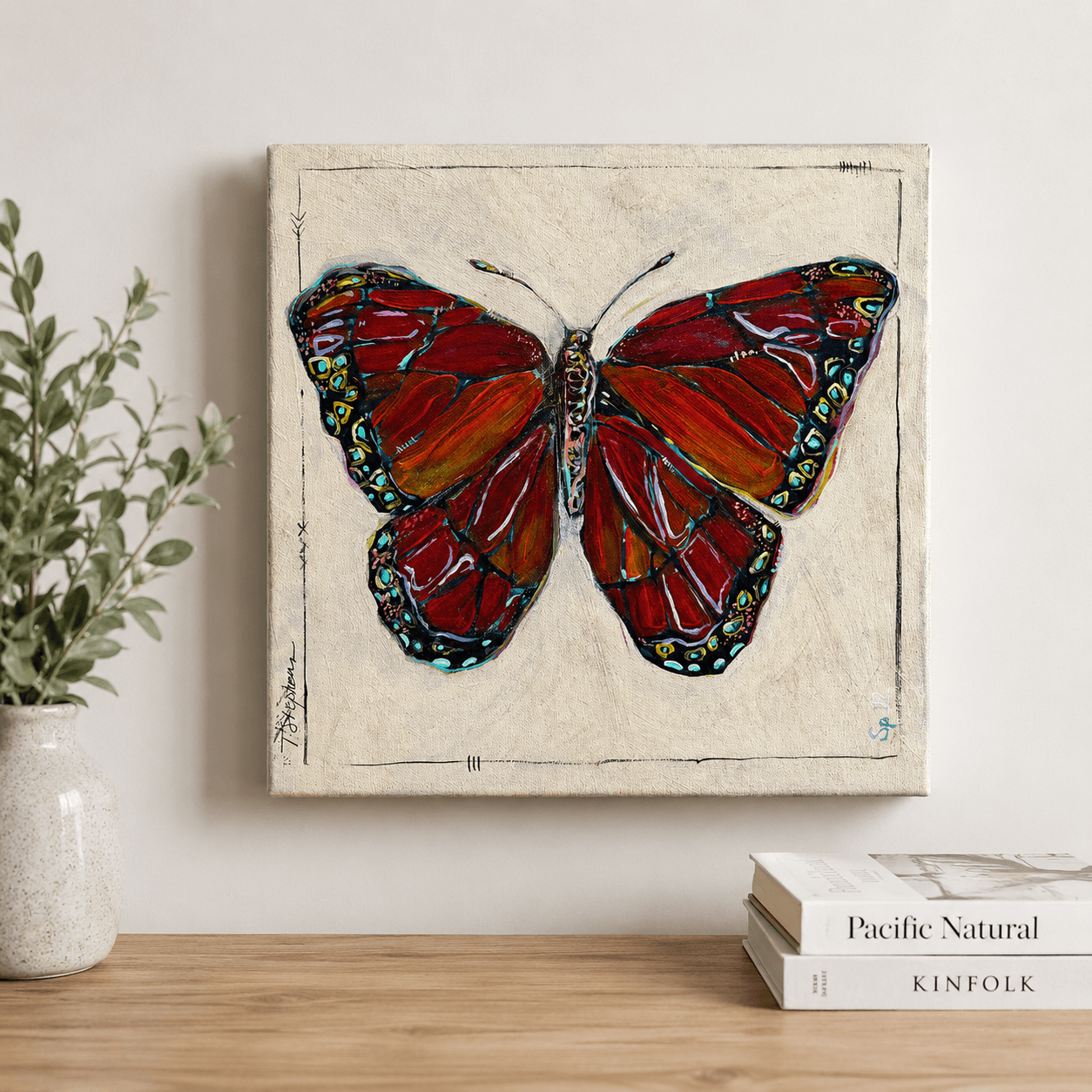 Viceroy is a brightly painted butterfly by artist Teri Stephens, with shades of crimson and orange.